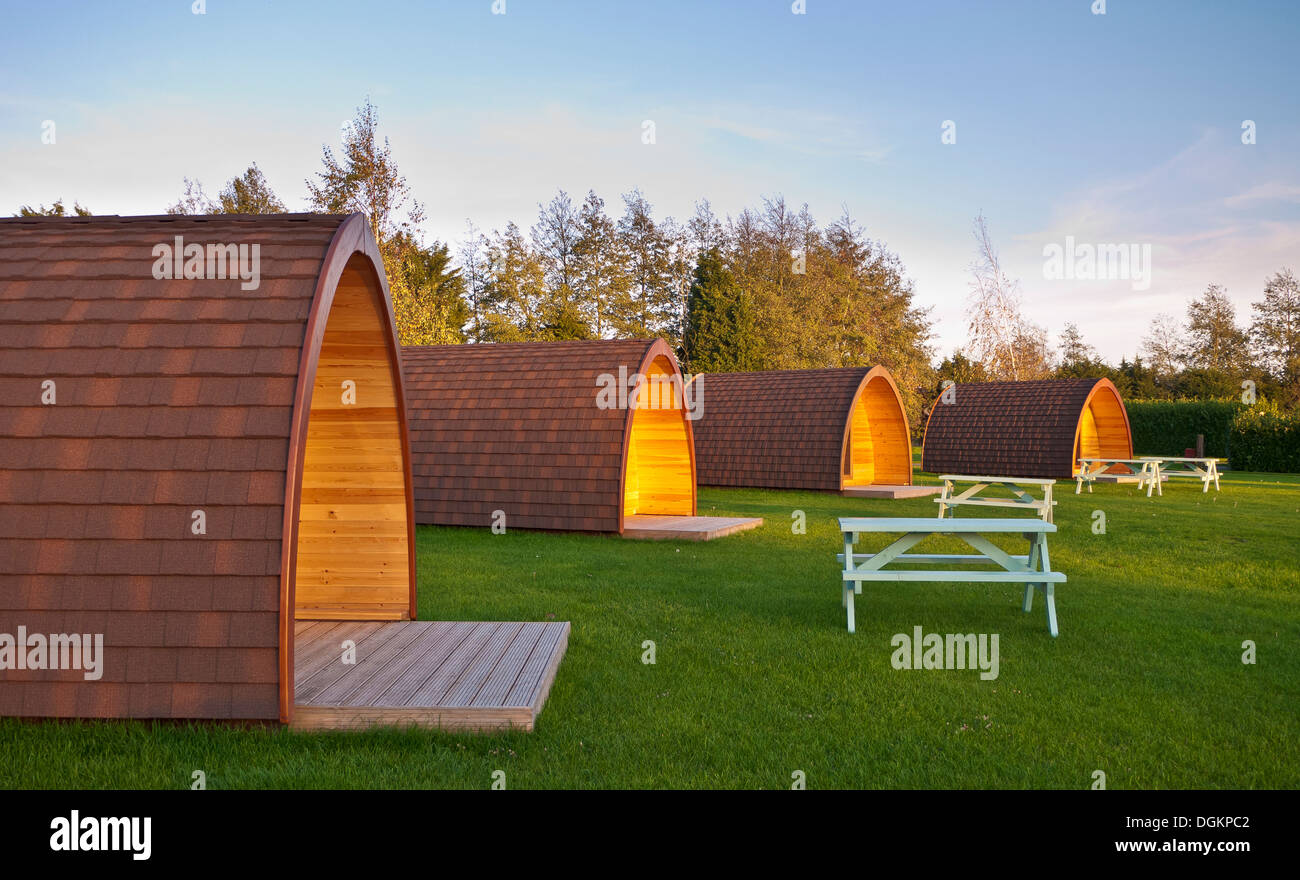 Wooden camping pods at Banham campsite in Norfolk. Stock Photo