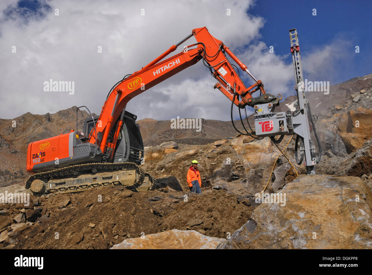 Road construction works on Mount Ruapehu with chisel excavator, Tongariro National Park, North Island, New Zealand Stock Photo