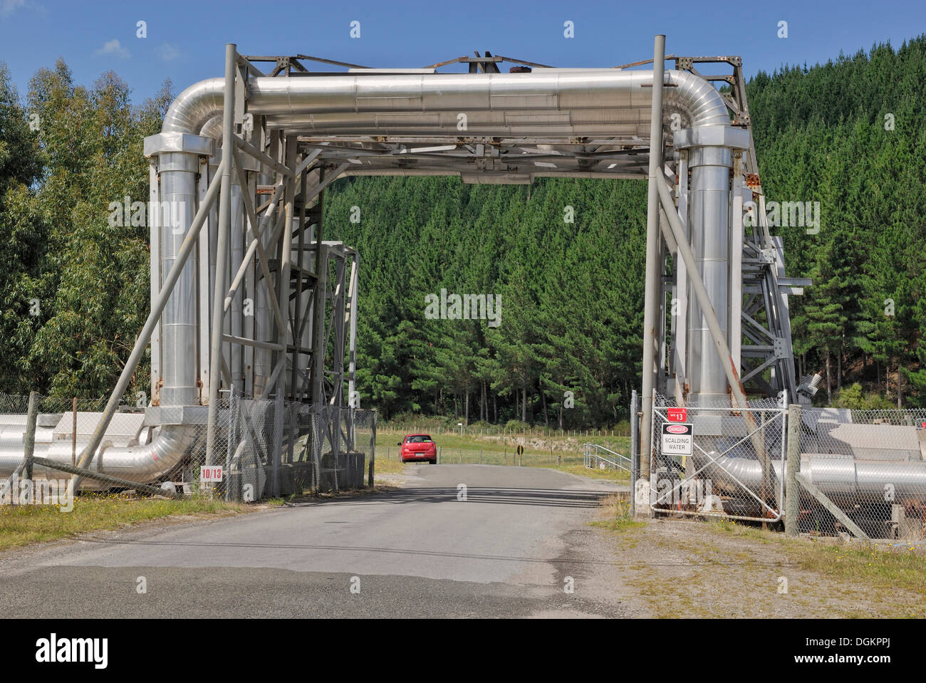 Geothermal power plant, Wairakei Borefield, pipelines crossing a road, North Island, New Zealand Stock Photo