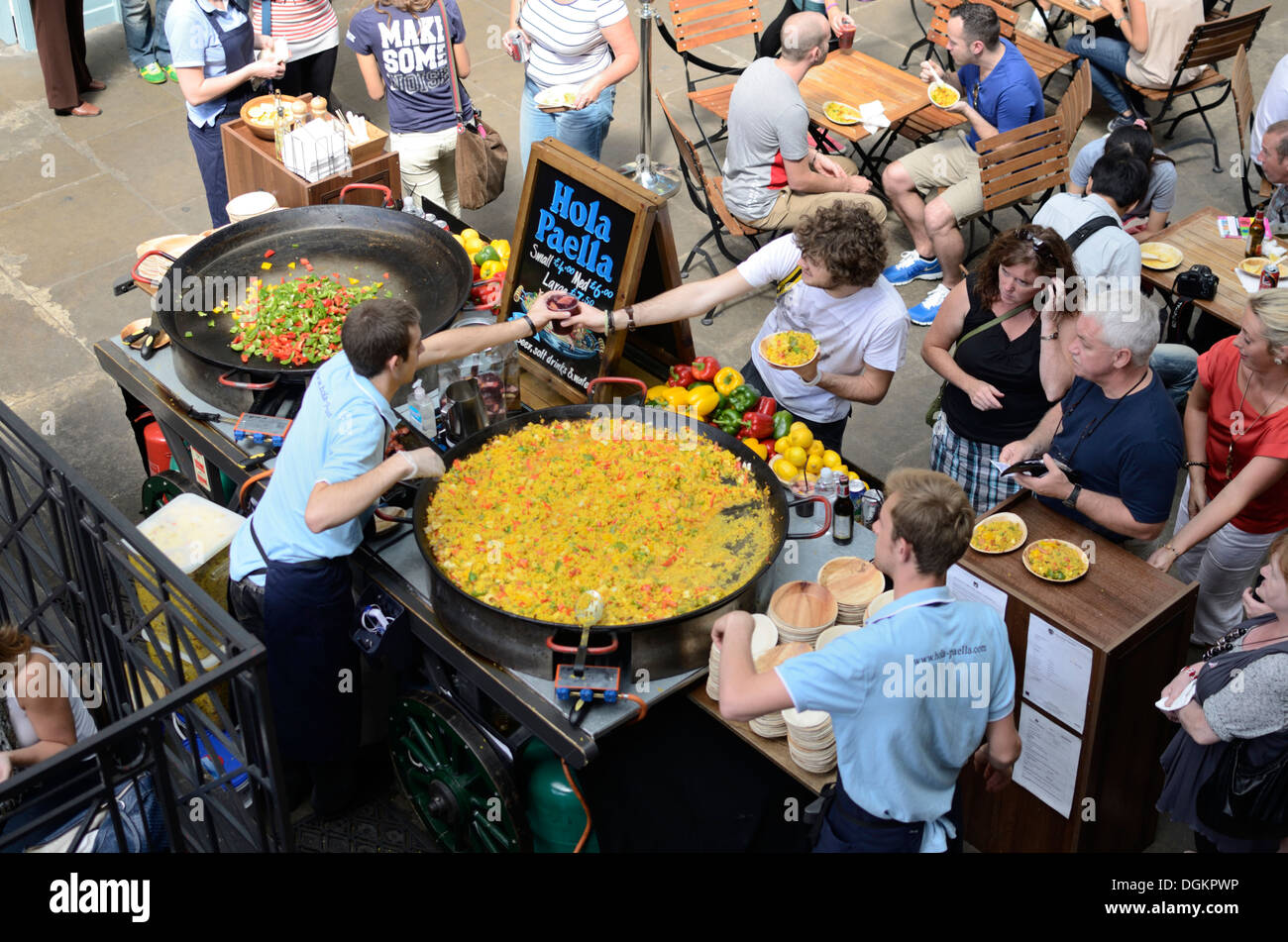 Paella stall in Old Covent Garden Market. Stock Photo