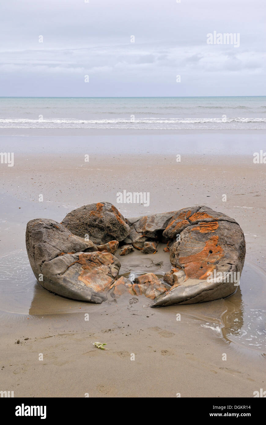 Broken boulder, geological formation of the Moeraki Boulders, Moeraki, East Coast, South Island, New Zealand Stock Photo