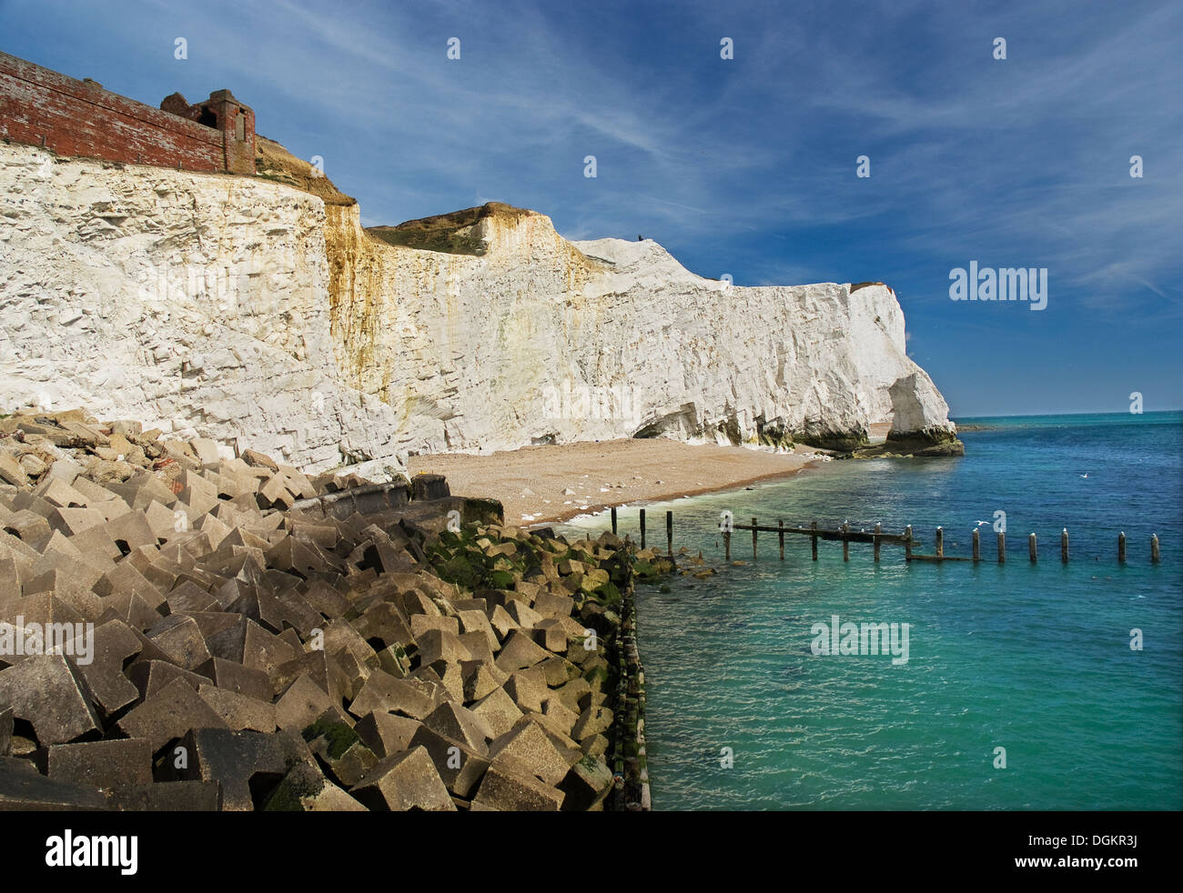 View of sea defences and breakwater at Seaford. Stock Photo