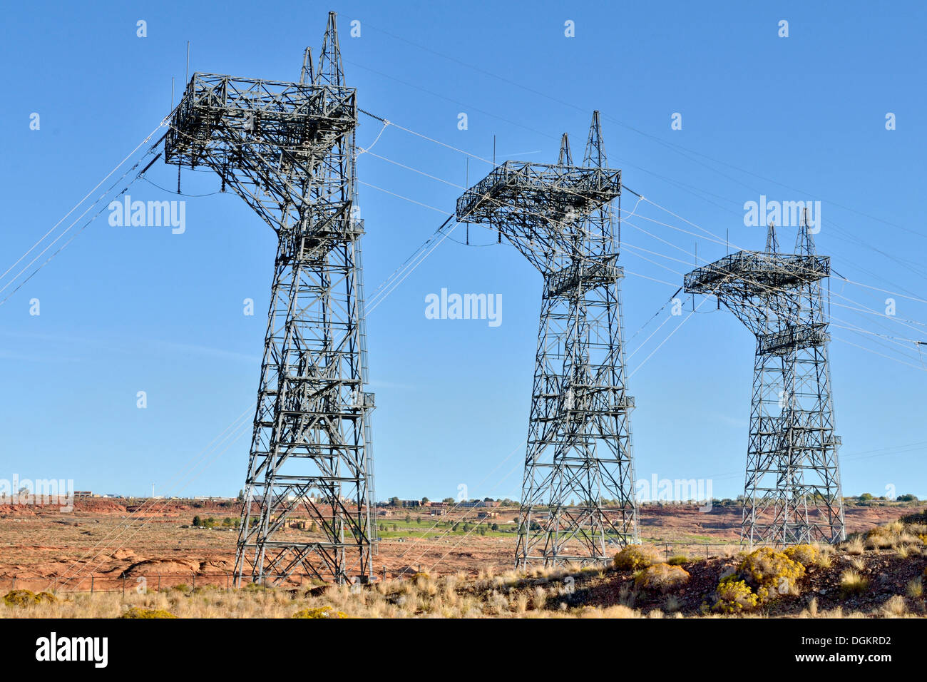 Metal masts for power lines, Glen Canyon Dam, Page, Arizona, United States Stock Photo