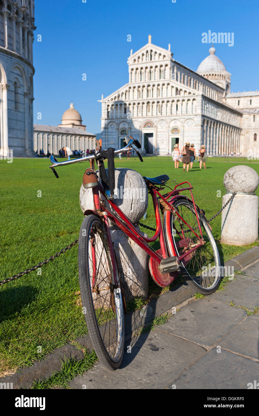 Cathedral at Piazza dei Miracoli with bicycle in the foreground. Stock Photo