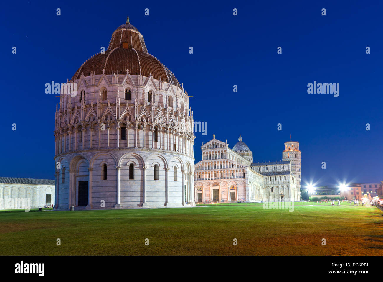 Baptistery with cathedral and Leaning Tower of Pisa at Piazza dei Miracoli. Stock Photo