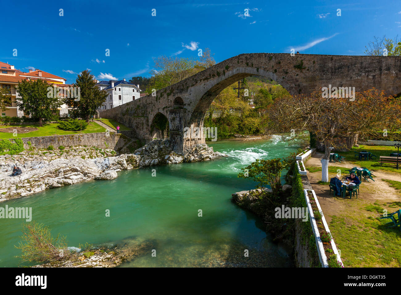 A view through the archway of a Roman bridge over the Sella River in Cangas De Onis. Stock Photo
