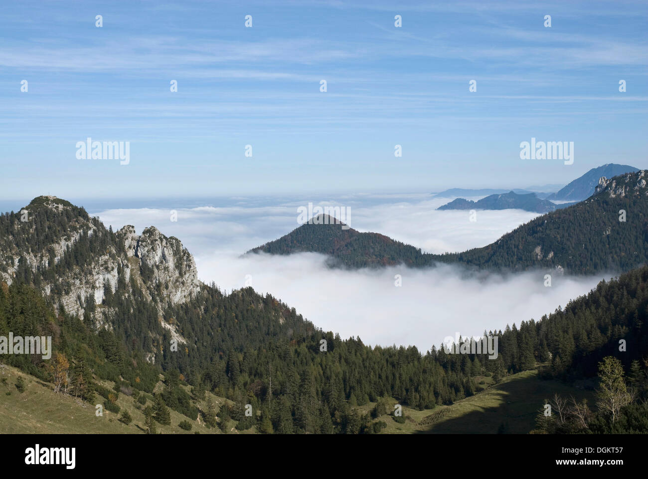 View of Kampenwand mountain, view from near the summit station looking towards the fog-shrouded Alps, Chiemgau area Stock Photo