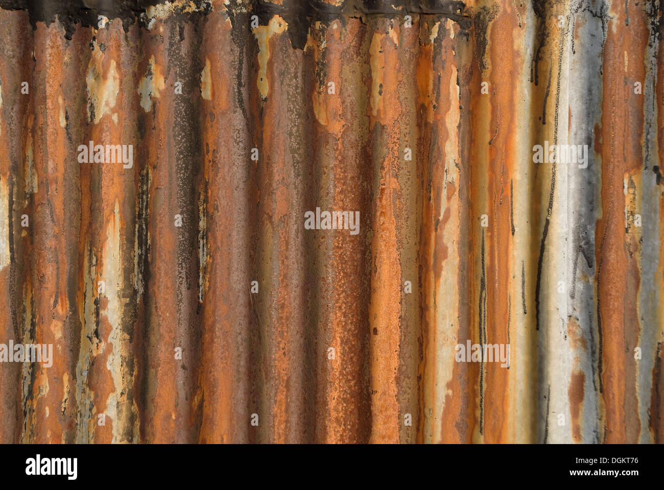 Rusty old corrugated metal plate, background Stock Photo