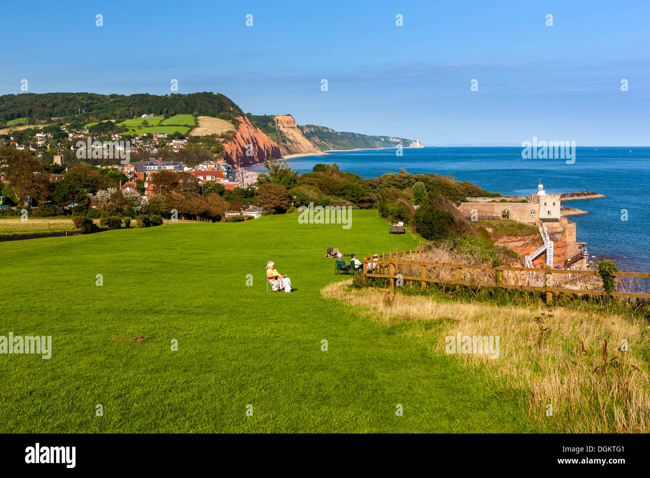 View from Peak Hill over town towards the red sandstone cliffs of the Jurassic Coast. Stock Photo