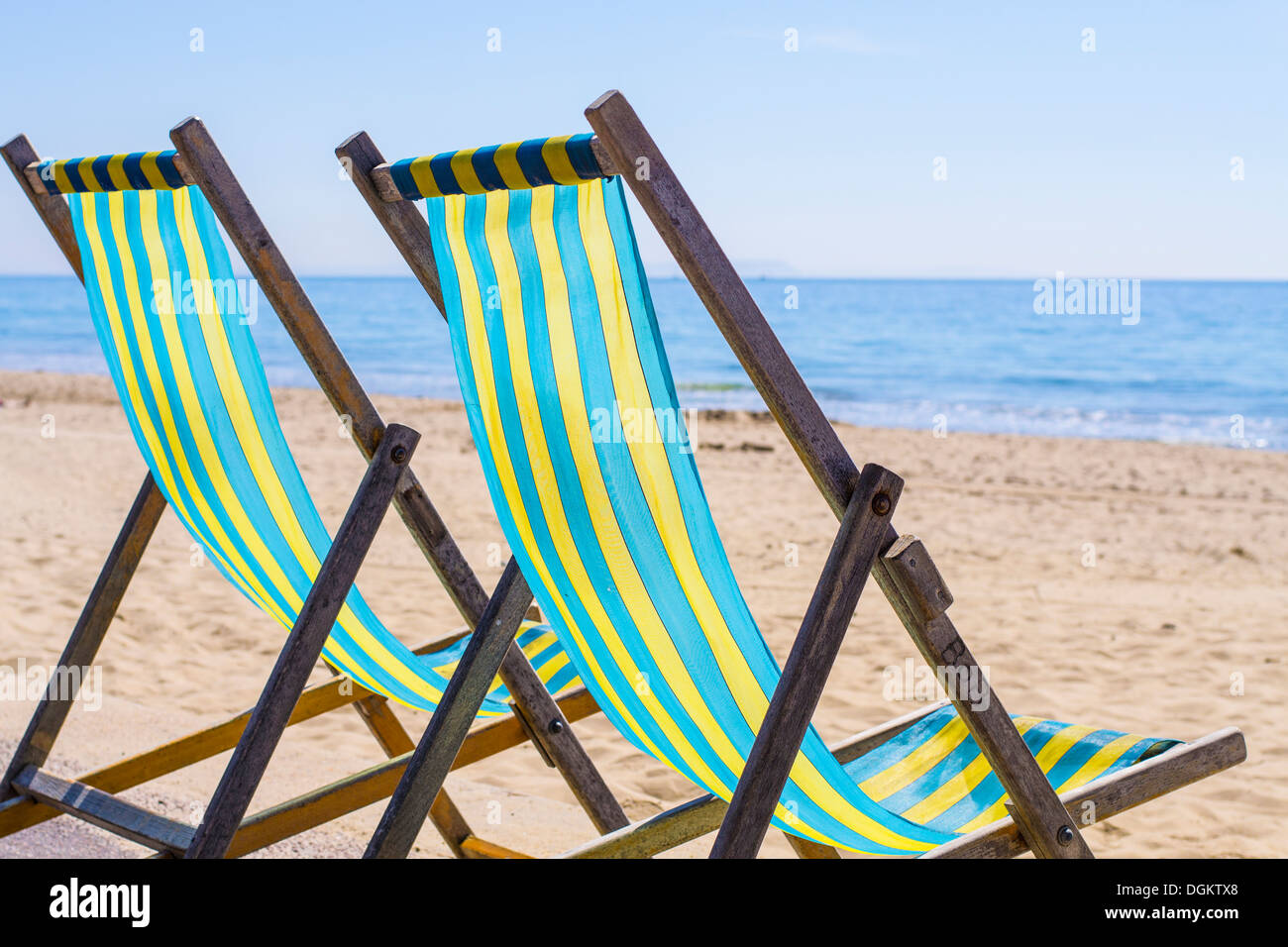 Deck chairs by the beachfront in Bournemouth. Stock Photo