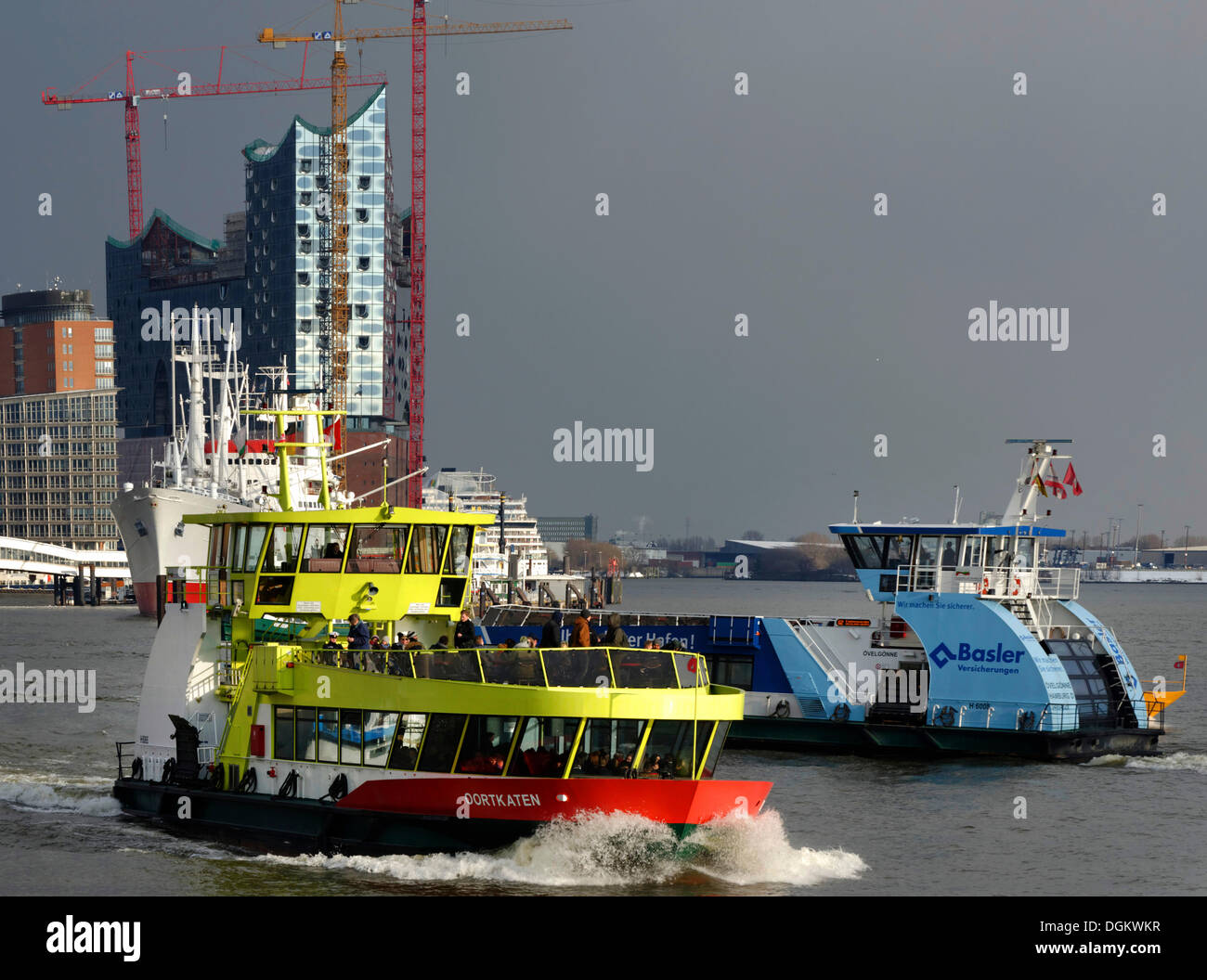 Ferries crossing the canal in front of the Cap San Diego and the Elbe Philharmonic Hall, Hamburg, Hamburg, Hamburg, Germany Stock Photo