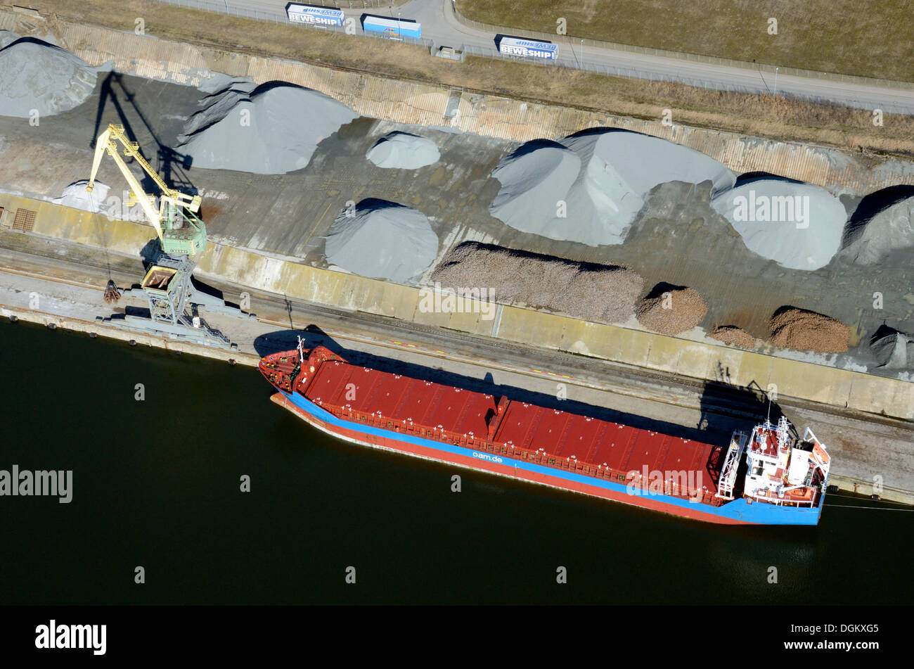 Aerial view, loading of bulk onto coaster of the Otto A. Mueller shipping company, at Lehmannkai, Lübeck, Schleswig-Holstein Stock Photo