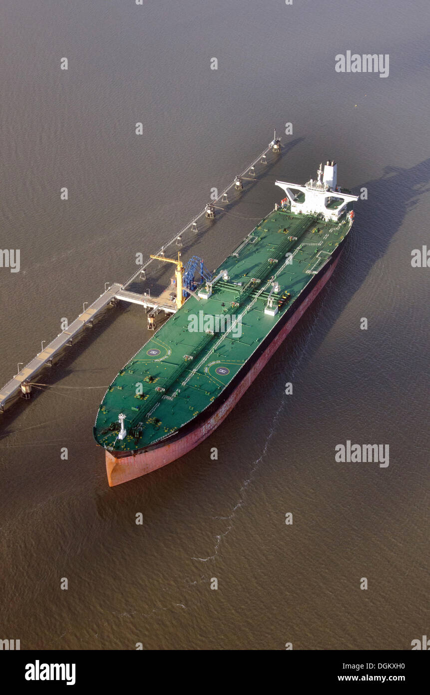 Aerial view, tanker loading at the marine loading arms of the Northwest oil line, Wilhelmshaven, Lower Saxony, Germany Stock Photo