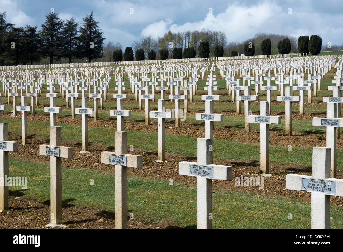 Graves, crosses, headstones with name plates on a military cemetery