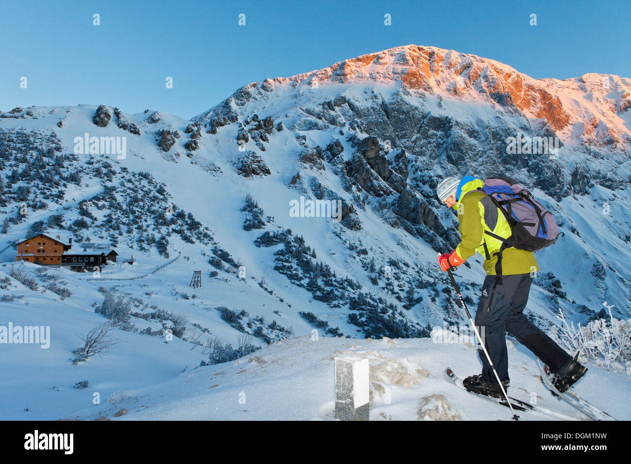Man Snowshoeing Towards Carl Von Stahl House On Torrener Joch Pass