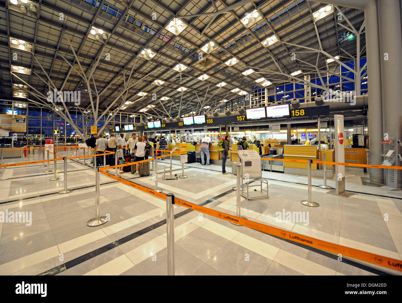 Passengers waiting in line at the check-in, Stuttgart Airport, Baden-Wuerttemberg Stock Photo