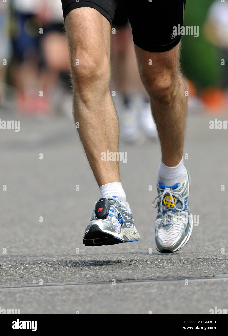 Marathon runner, running shoes, ChampionChip fixed on the shoe, used to keep track of the competition times of athletes Stock Photo