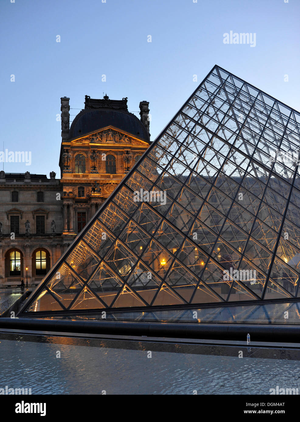 Pavilion Richelieu in the evening, glass pyramid entrance in front, Palais du Louvre or Louvre Palace museum, Paris, France Stock Photo
