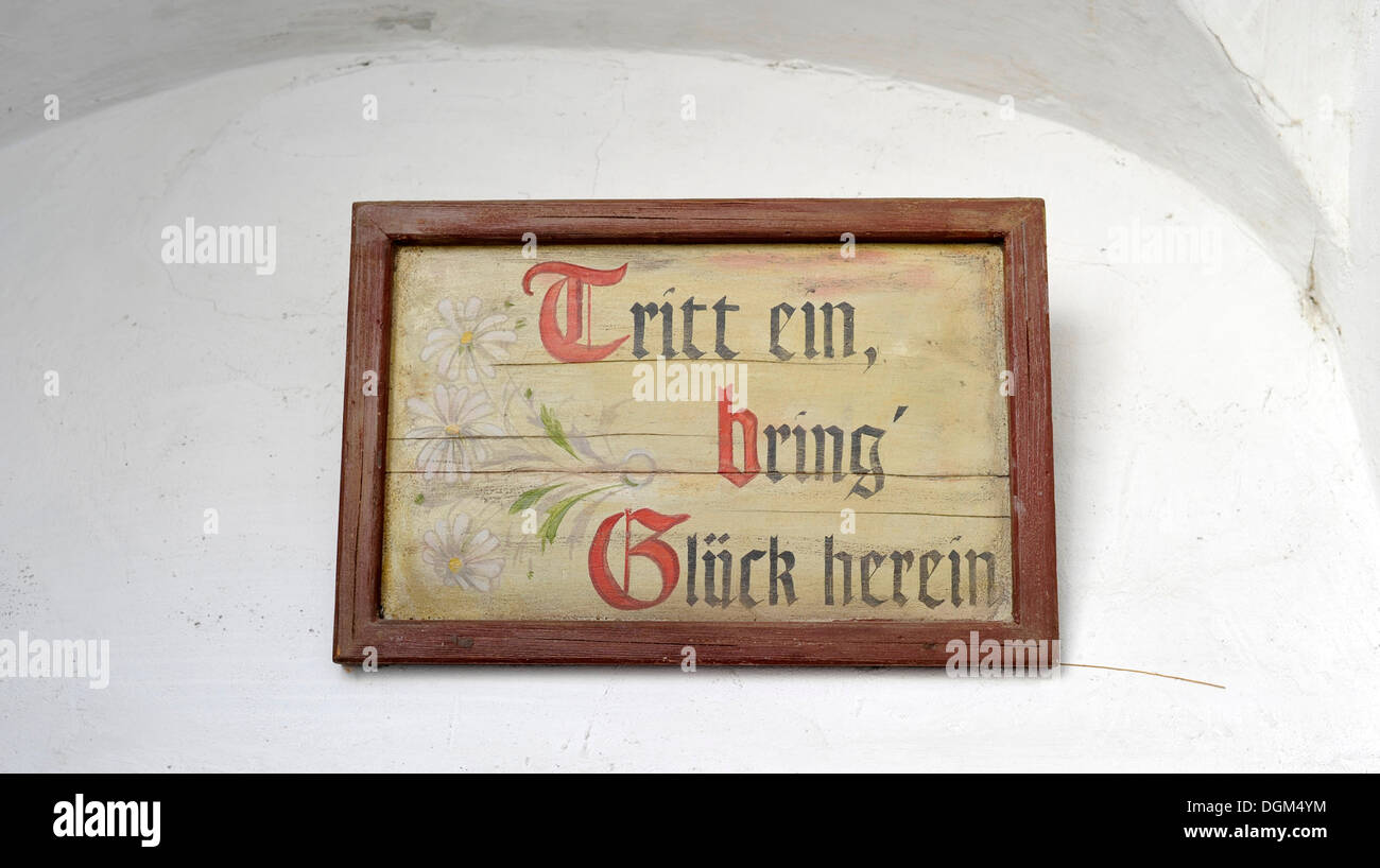 Entrance sign, Tritt ein, bring' Glueck herein, German for Come in and bring good fortune, Museum House, Loisium World of Wine, Stock Photo