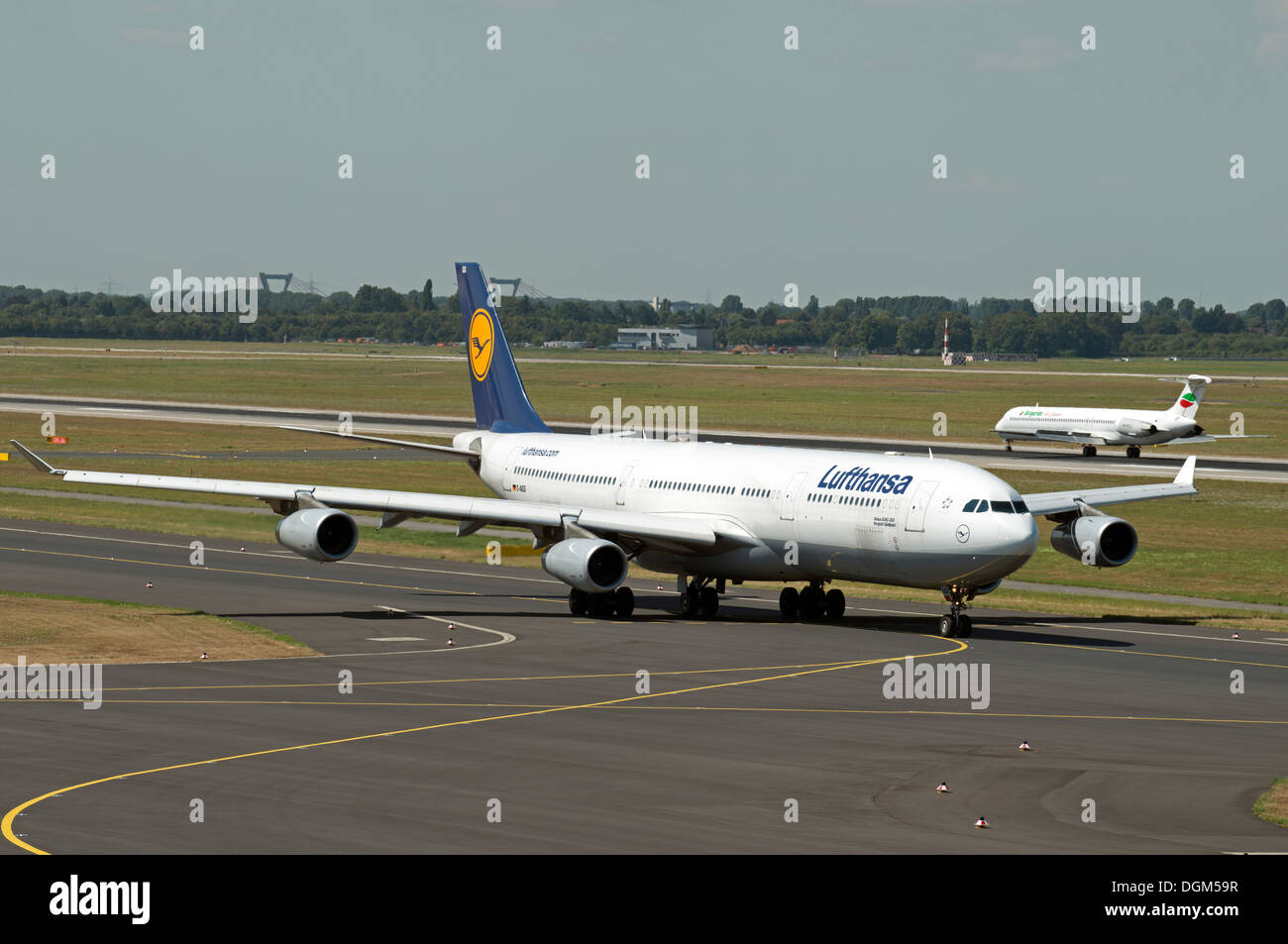 Lufthansa Airbus A340-300 taxiing to the runway at Dusseldorf International airport Stock Photo