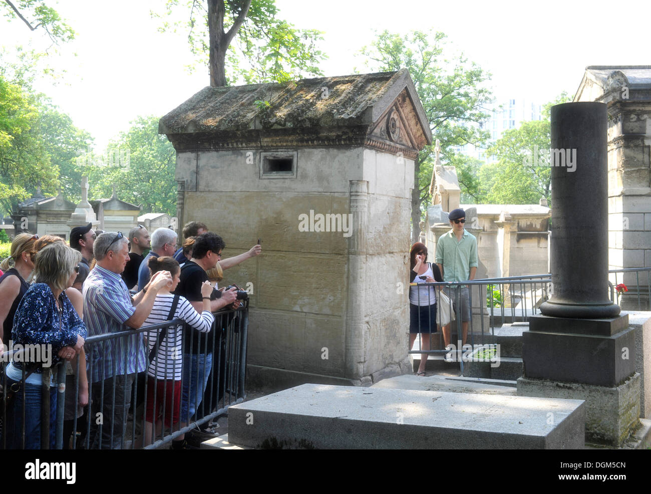 Tourists at the grave of Jim Morrison, Cimetière du Père Lachaise Cemetery, Paris, France, Europe, PublicGround Stock Photo