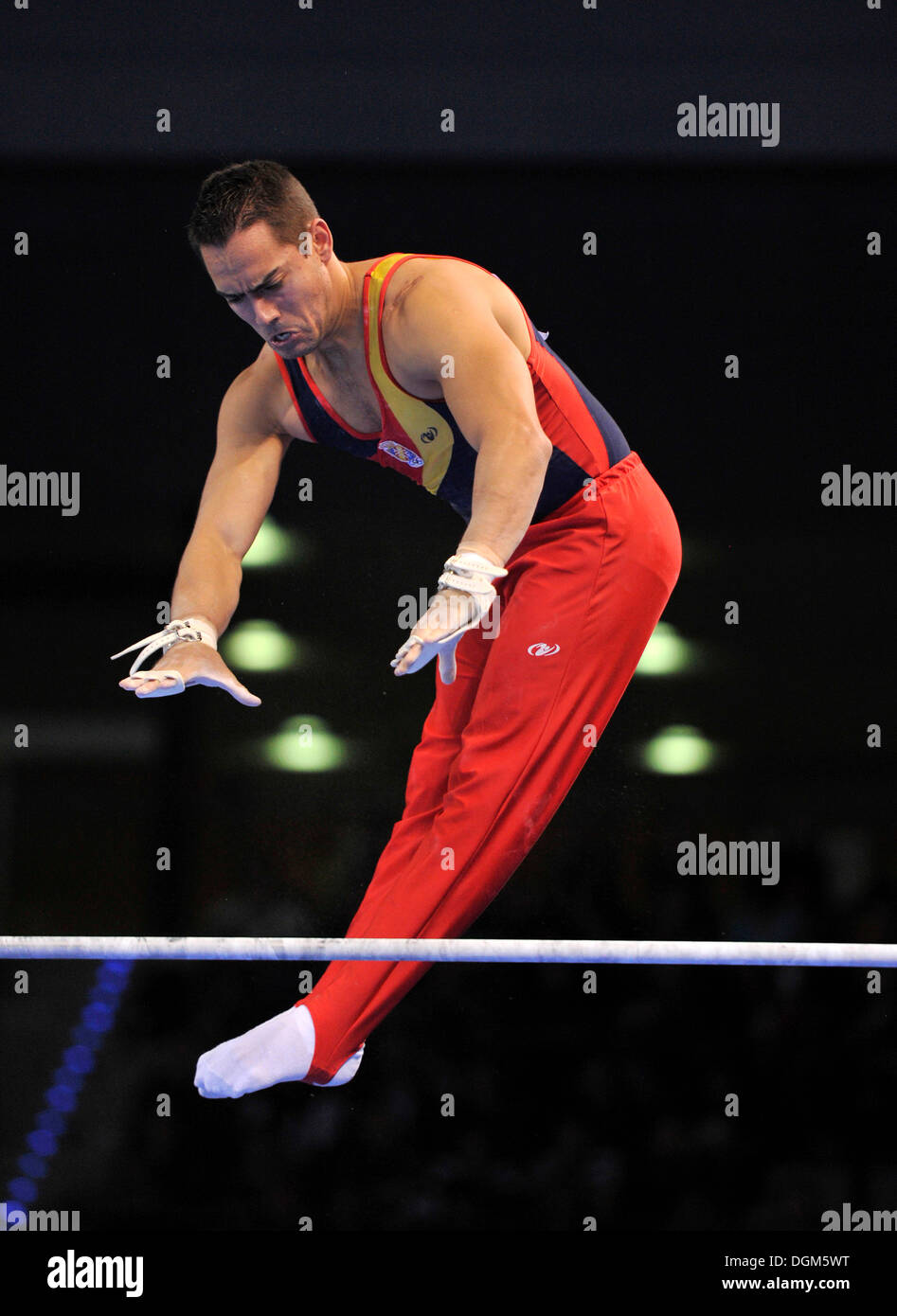 Rafael Martinez, ESP, performing on high bar, EnBW Gymnastics World Cup, 11 to 13 Nov 2011, 29th DTB Cup, Porsche-Arena Stock Photo