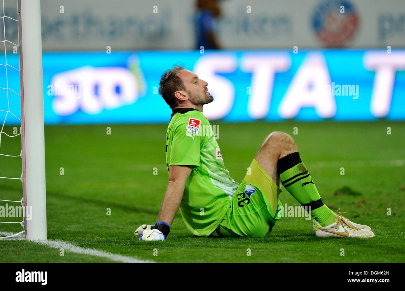 Goalkeeper Tom Starke, TSG 1899 Hoffenheim, on the ground, disappointed