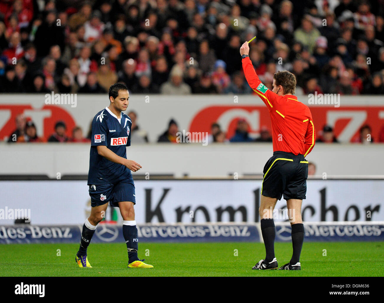 Referee Dr. Felix Brych, showing yellow card to Ammar Jemal, 1. FC Koeln, warning, Mercedes-Benz Arena, Stuttgart Stock Photo