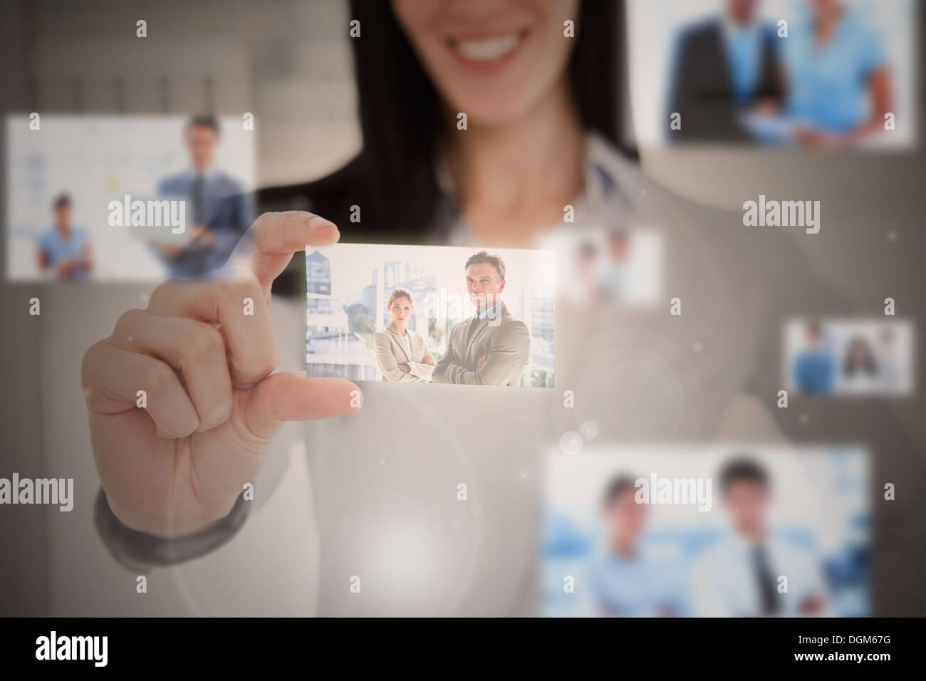 Businesswoman using futuristic interface Stock Photo
