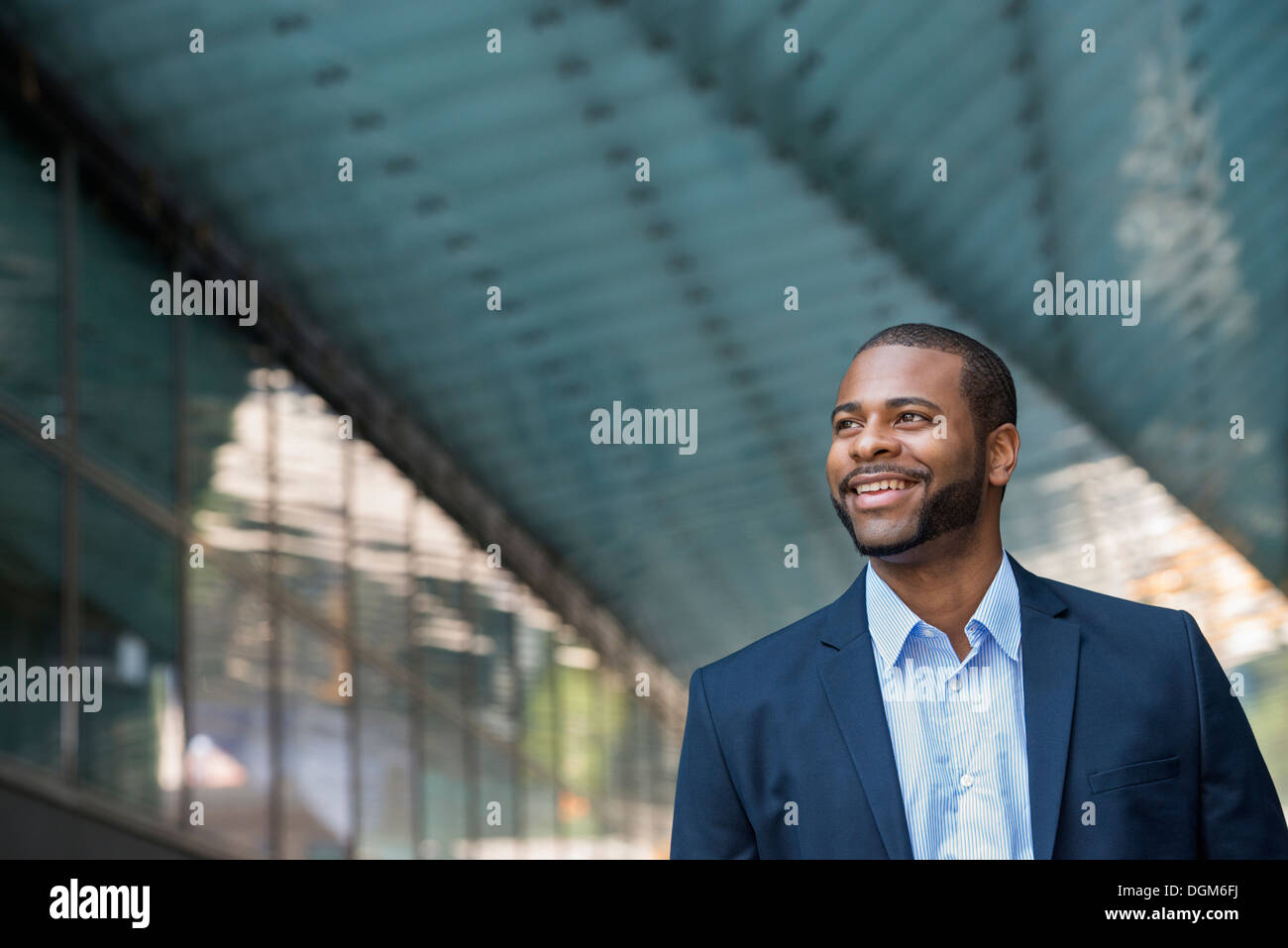 Summer. A man in a blue jacket and open necked shirt. Stock Photo