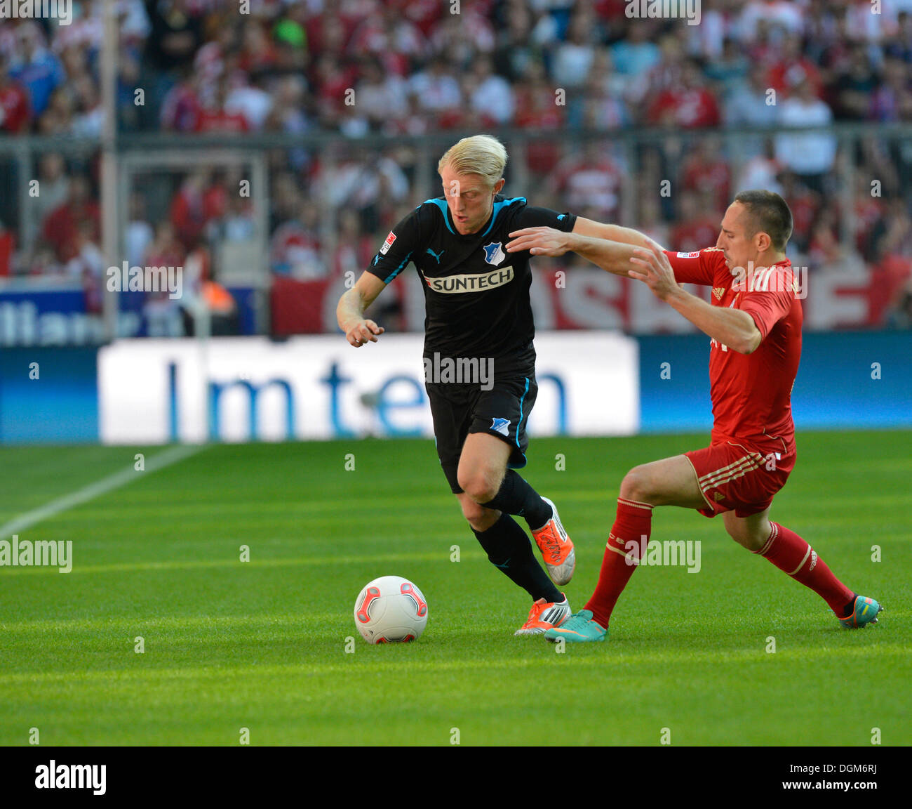 Tackle, Andreas Beck, TSG 1899 Hoffenheim, on the left, versus Franck Ribery, FC Bayern Munich, on the right, Allianz Arena Stock Photo