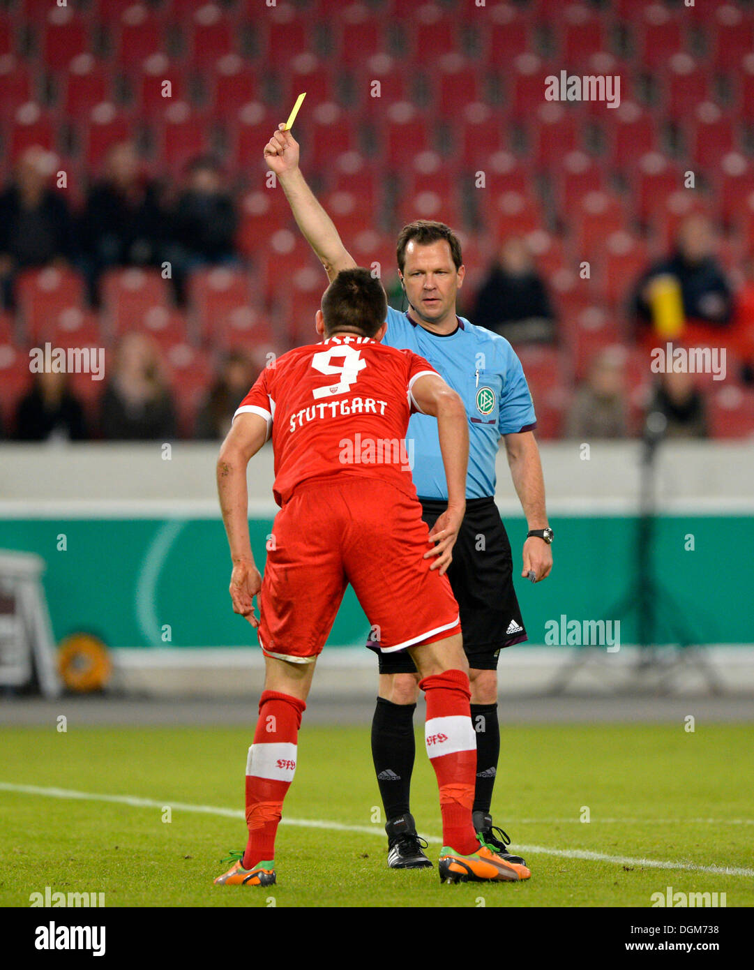 Vedad Ibisevic, VfB Stuttgart, receiving a yellow card from the referee Peter Sippel, Mercedes-Benz Arena, Stuttgart Stock Photo