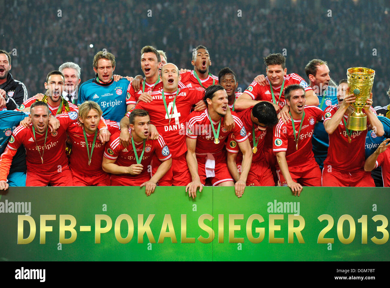 FC Bayern celebrating their triple victory, team photo with the trophy, DFB Cup final 2013, FC Bayern Munich vs VfB Stuttgart in Stock Photo