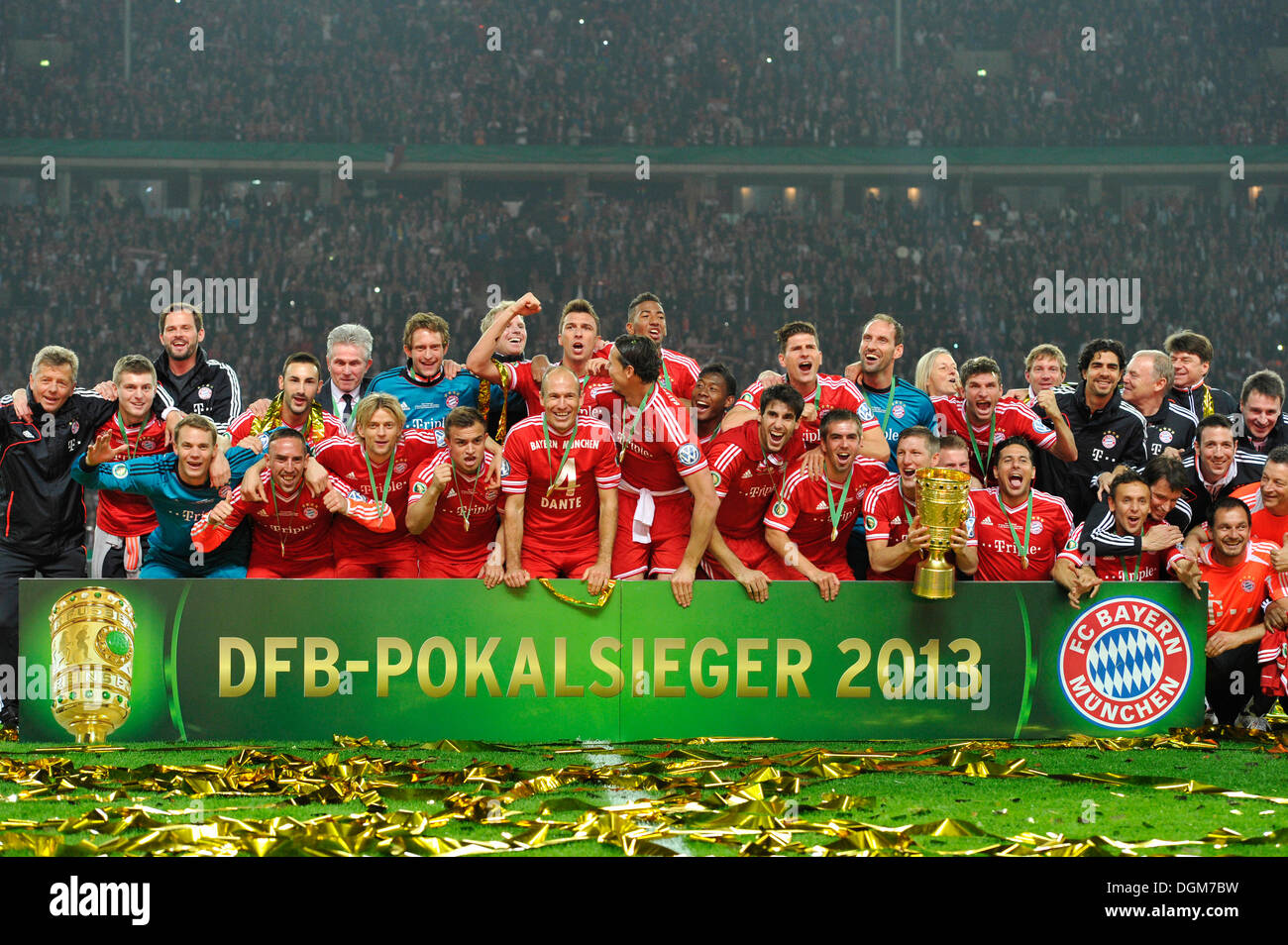 FC Bayern celebrating their triple victory, team photo with the trophy, DFB Cup final 2013, FC Bayern Munich vs VfB Stuttgart in Stock Photo