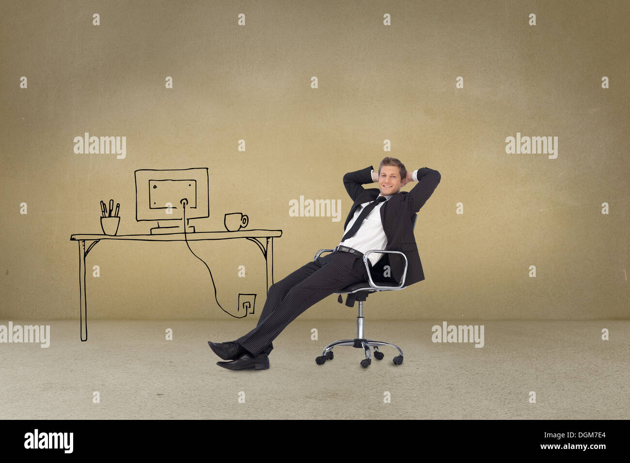 Businessman sitting cross armed next to painted desk Stock Photo
