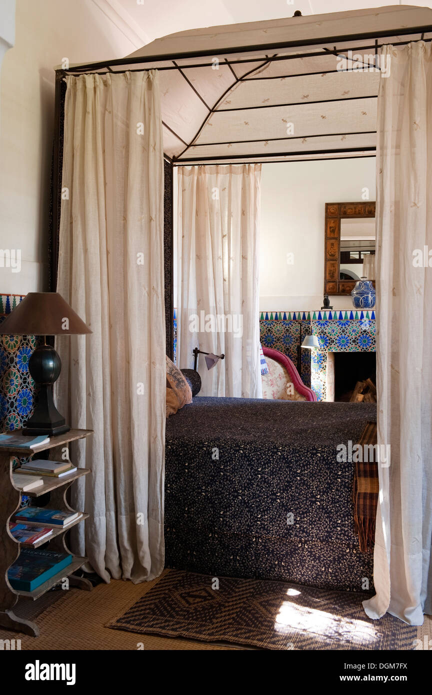 Moroccan four poster bed deals
