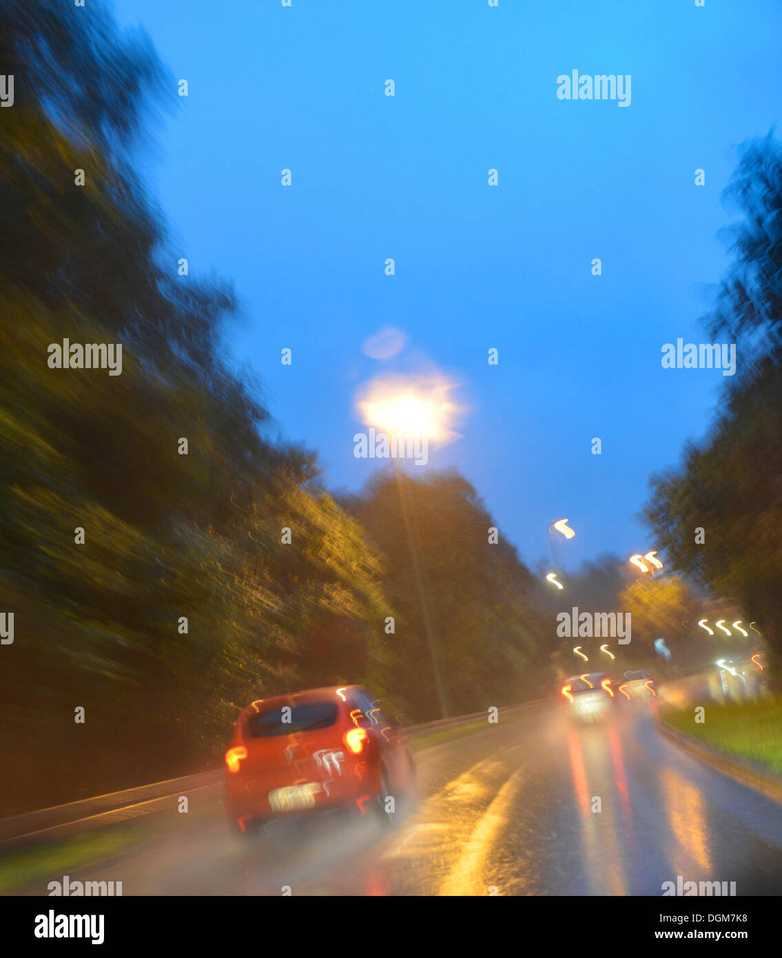 Drunk driving, vision impaired through alcohol or drugs, danger, poor visibility in rain and night, München, Bavaria, Germany Stock Photo