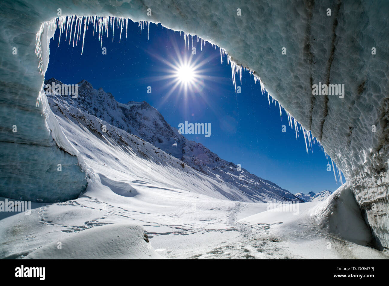 view from inside a glacier mouth  outside in a beautiful sunlight in a blue sky Stock Photo