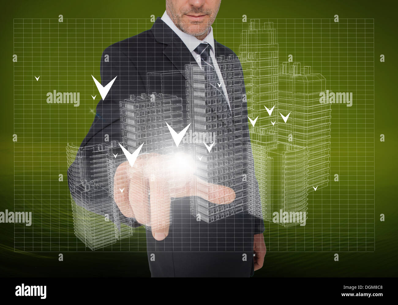 Businessman pointing at holographic faint city Stock Photo