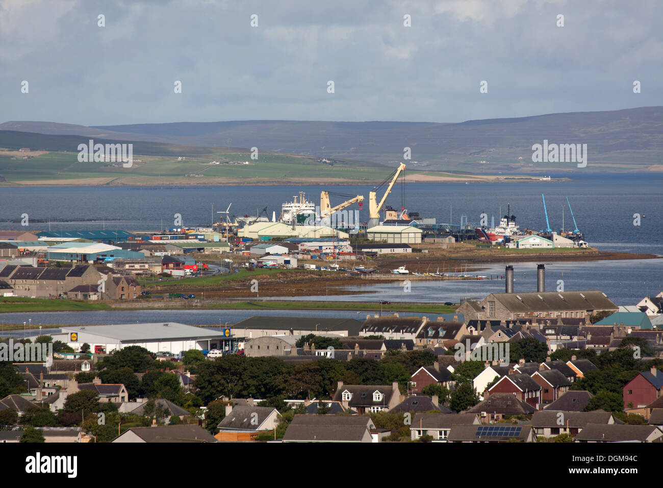 Islands of Orkney, Scotland. Elevated view over the Orkney town of Kirkwall with the Haston ferry terminal in the background. Stock Photo