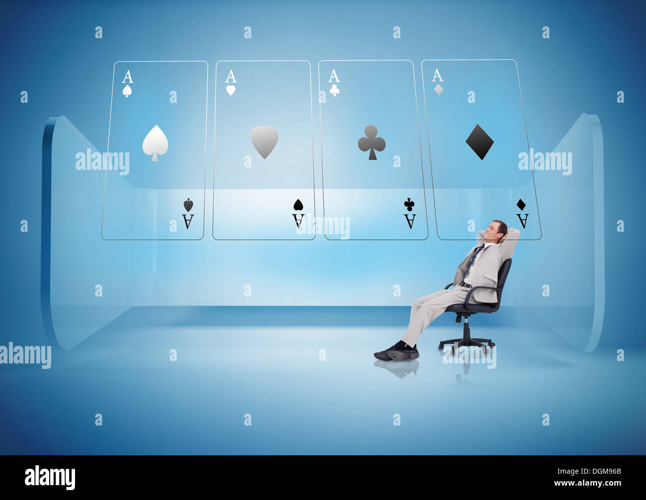 Businessman on swivel chair looking at holographic cards Stock Photo