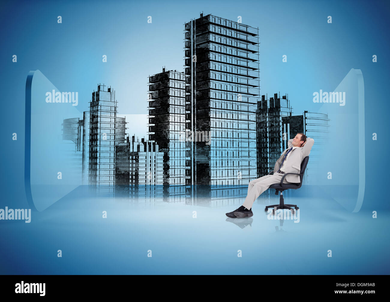 Businessman on swivel chair looking at holographic city Stock Photo