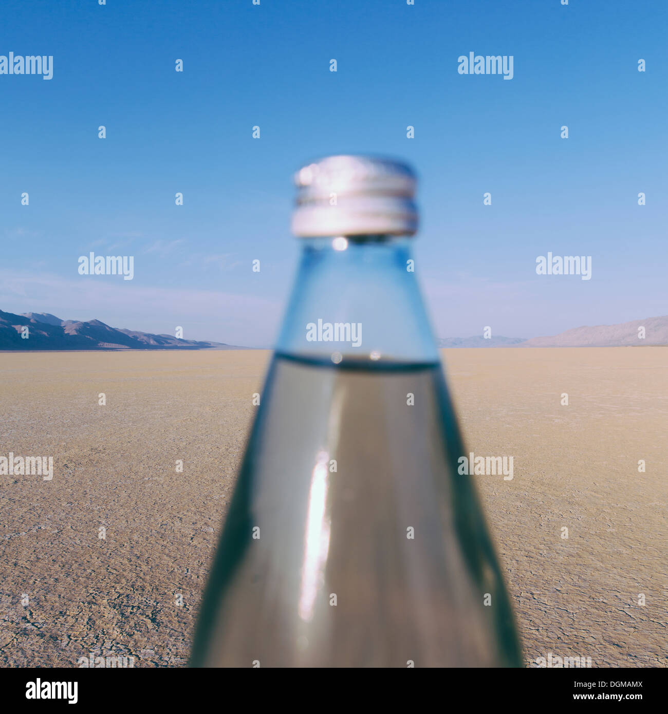 The landscape of the Black Rock Desert in Nevada. A bottle of water. Filtered mineral water. Stock Photo