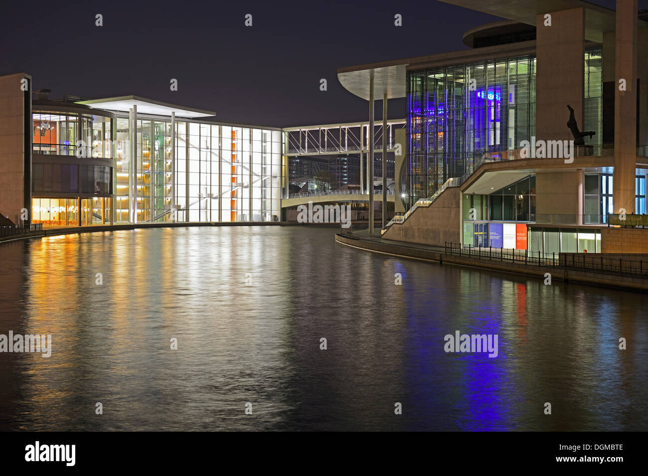 Water side of the Paul Loebe Building, rear, Marie-Elisabeth Lueders Building, right, on the Spree River in the evening Stock Photo