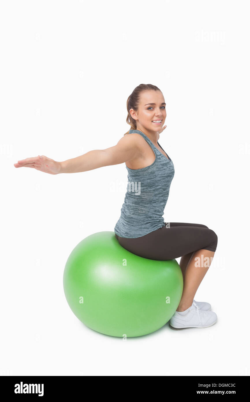 Lovely fit woman stretching her arms Stock Photo