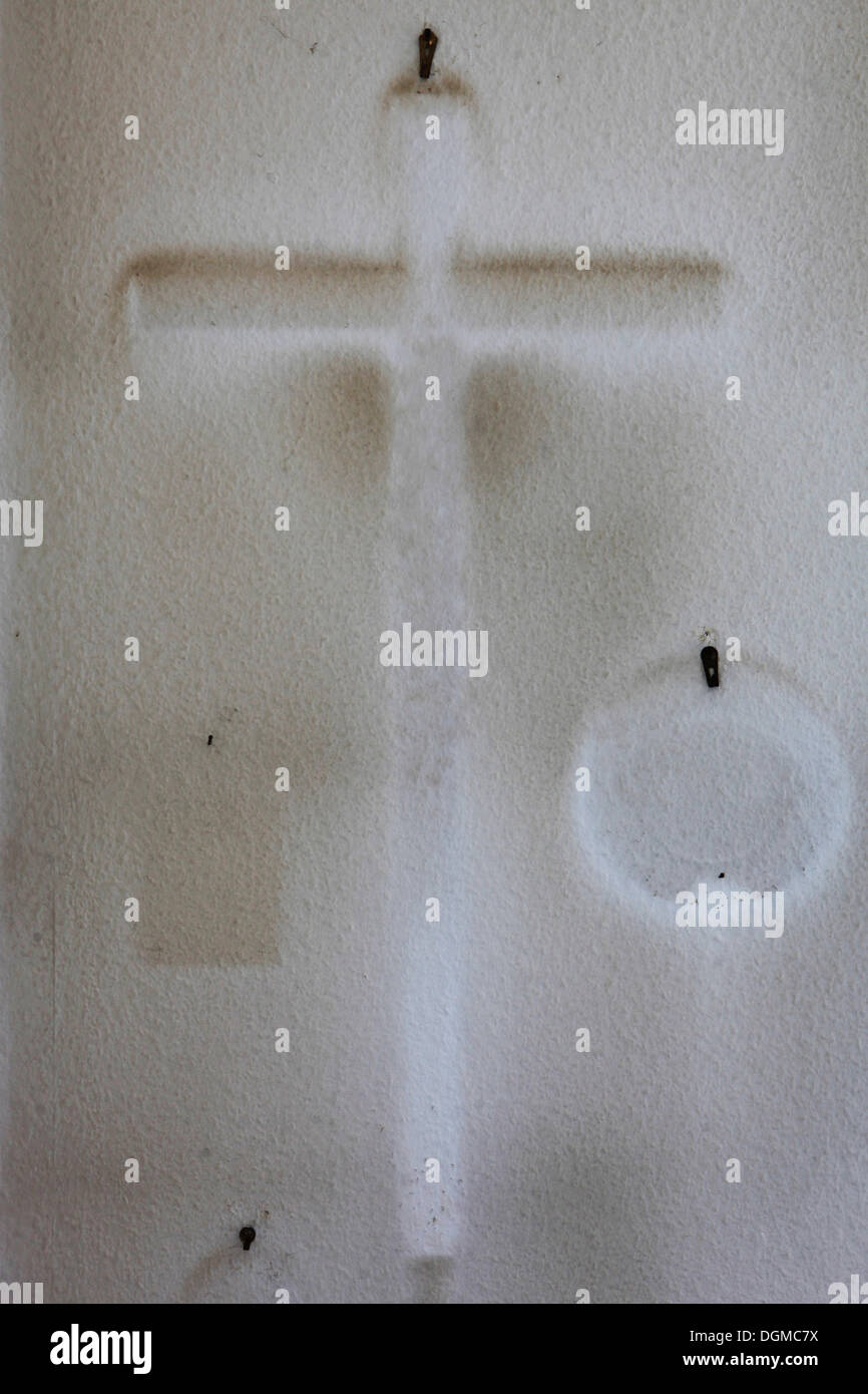 Contours of a crucifix taken off the wall, symbolic image for the declining number of believers of the Catholic Church Stock Photo