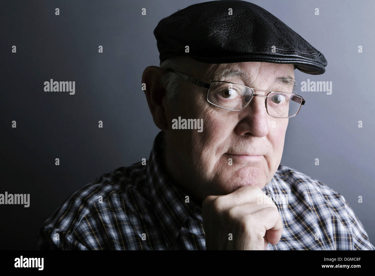 Senior citizen, elderly man, with a cap and glasses, portrait Stock Photo