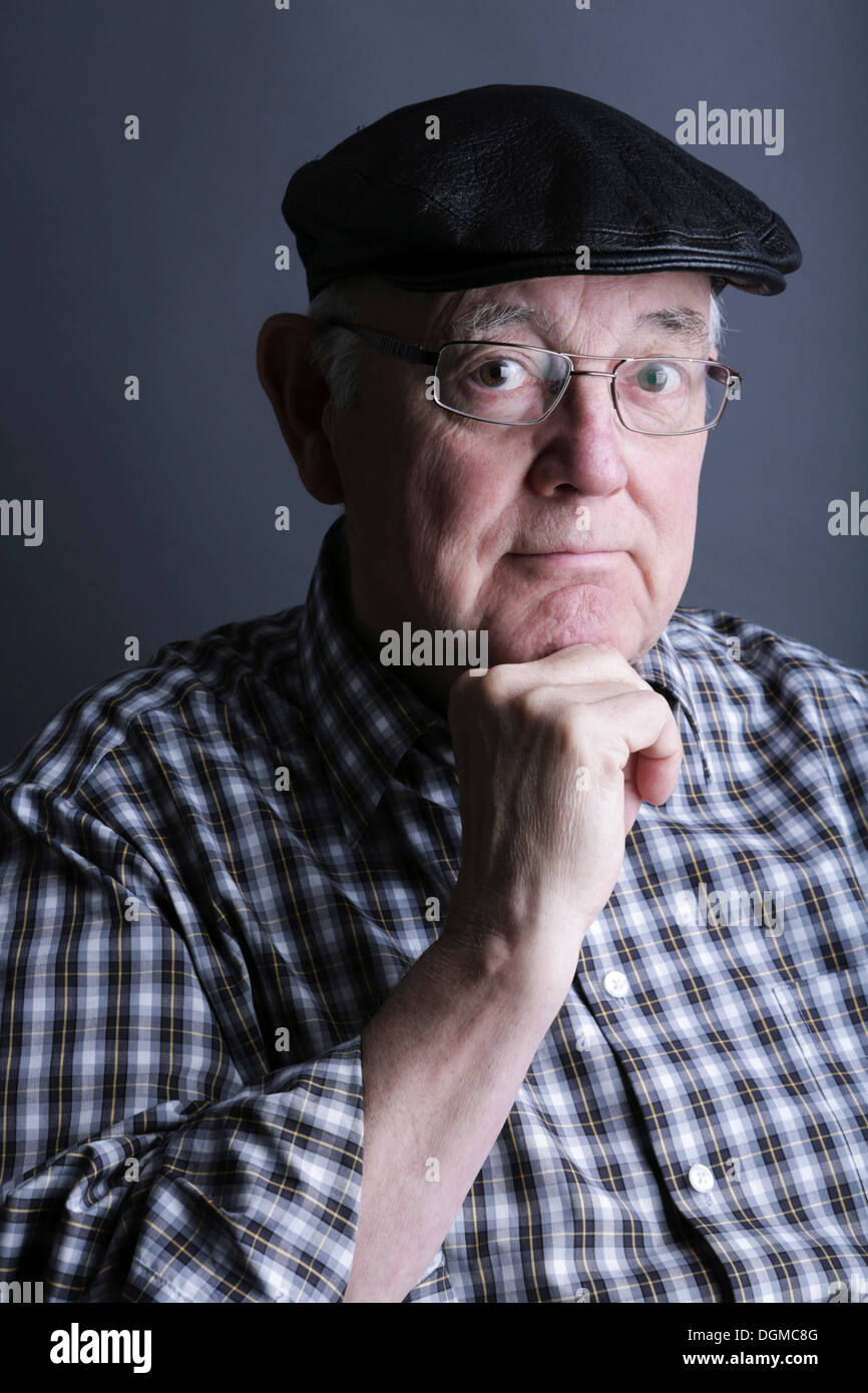 Senior citizen, elderly man, with a cap and glasses, portrait Stock Photo