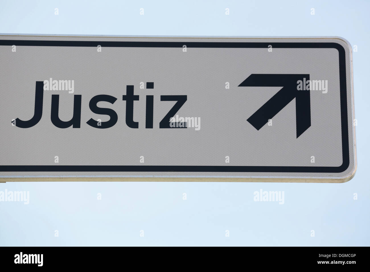 Sign, 'Justiz', German for Justice, with an arrow pointing up, Cologne, Rhineland, North Rhine-Westphalia, Germany Stock Photo