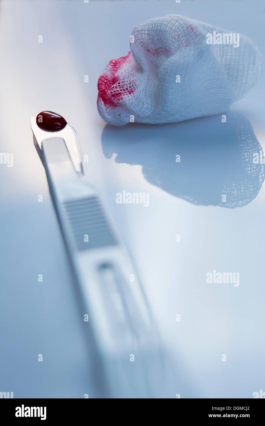 Scalpel and blood on a cotton swab, surgery, Germany Stock Photo Alamy